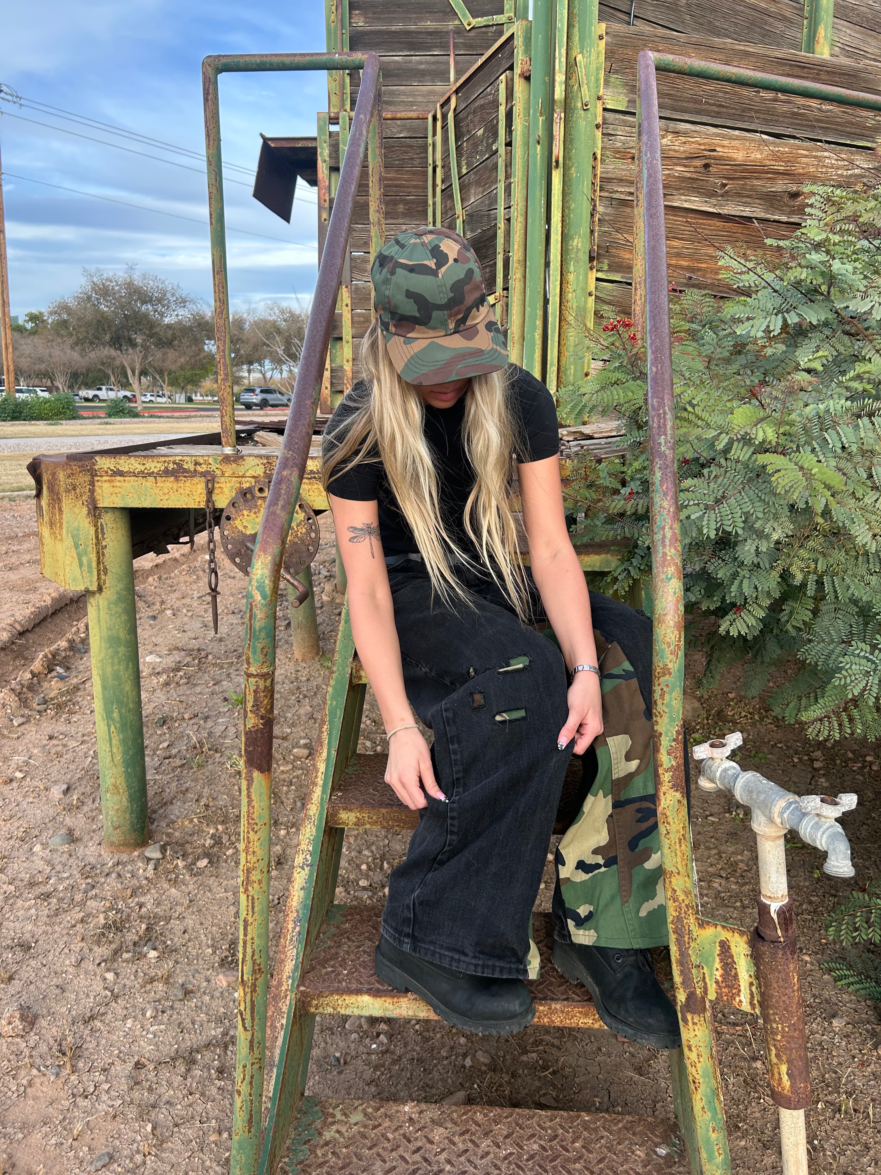 Black jeans with camo inserts