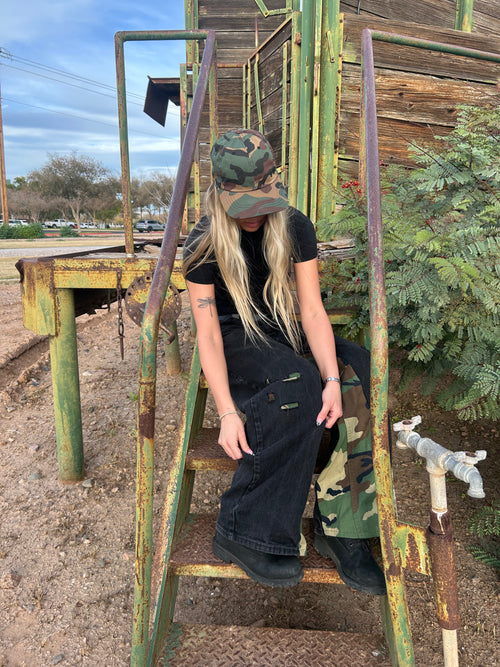 Black jeans with camo inserts