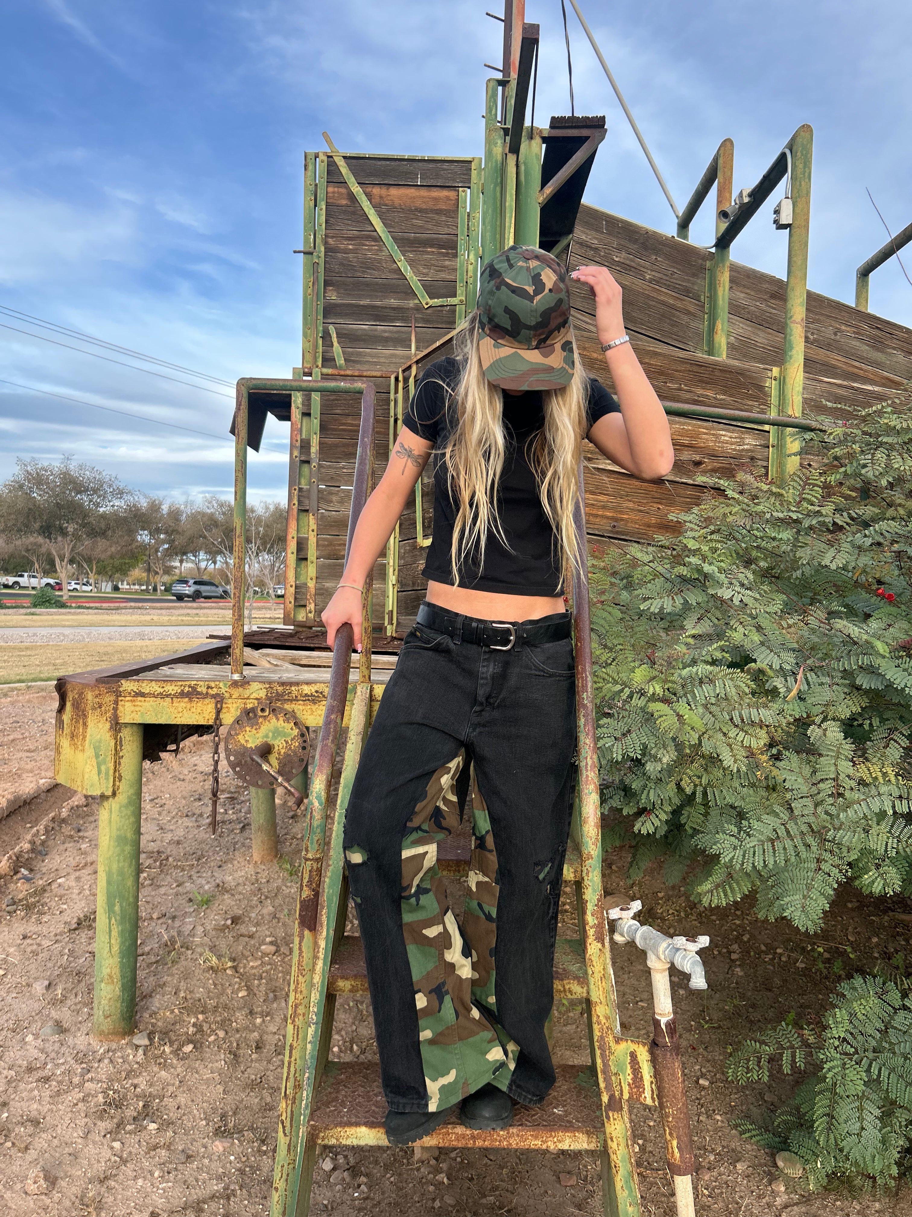 Black jeans with camo inserts