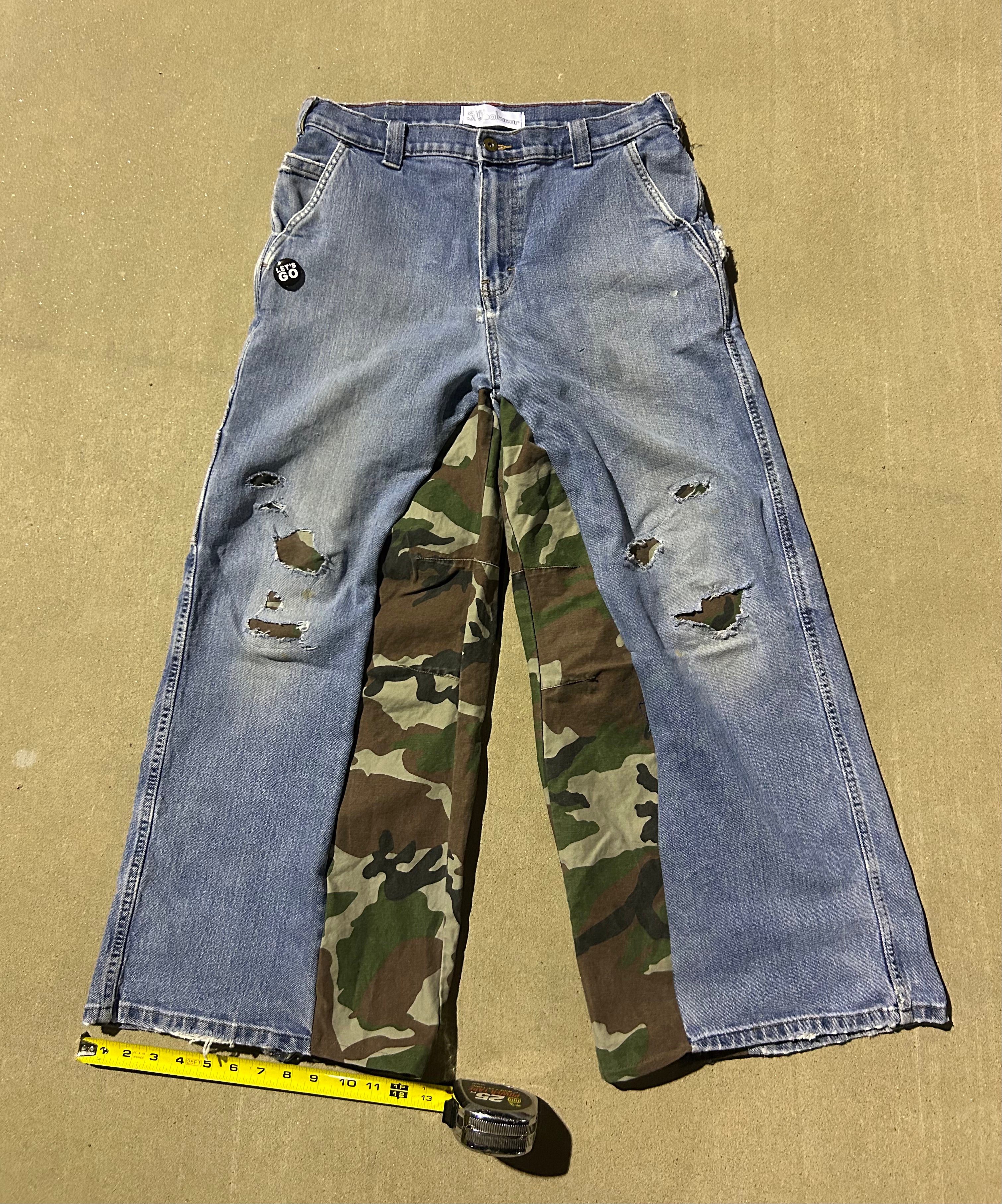 Blue jeans with camo inserts