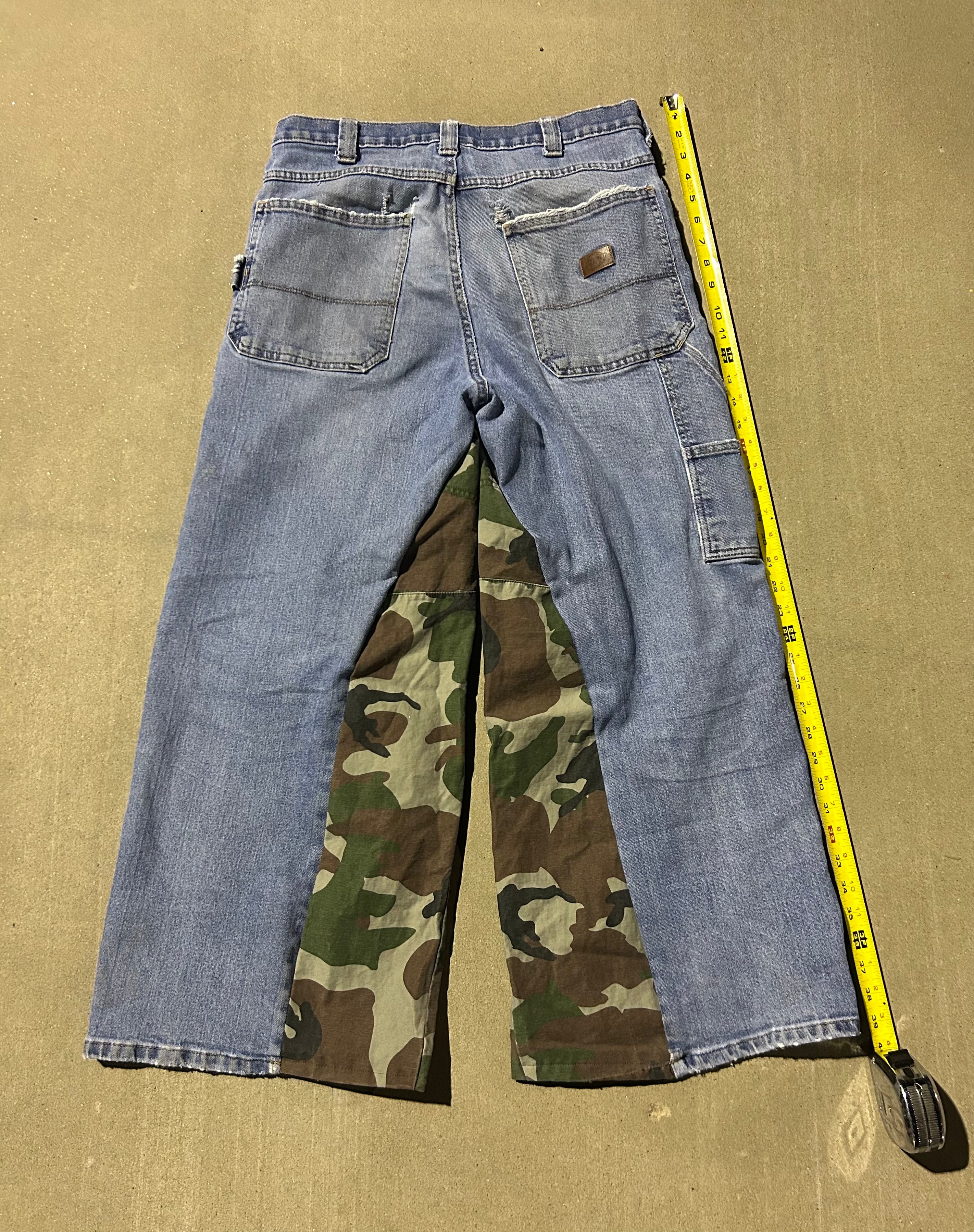 Blue jeans with camo inserts