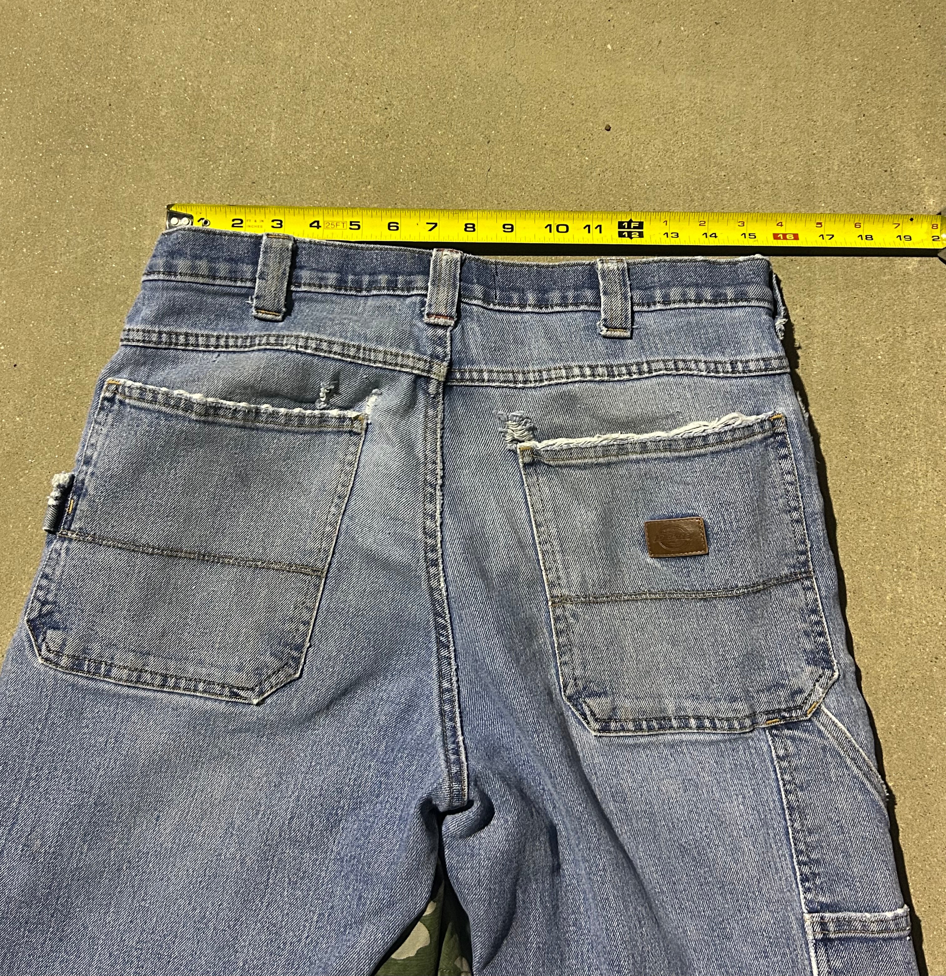 Blue jeans with camo inserts