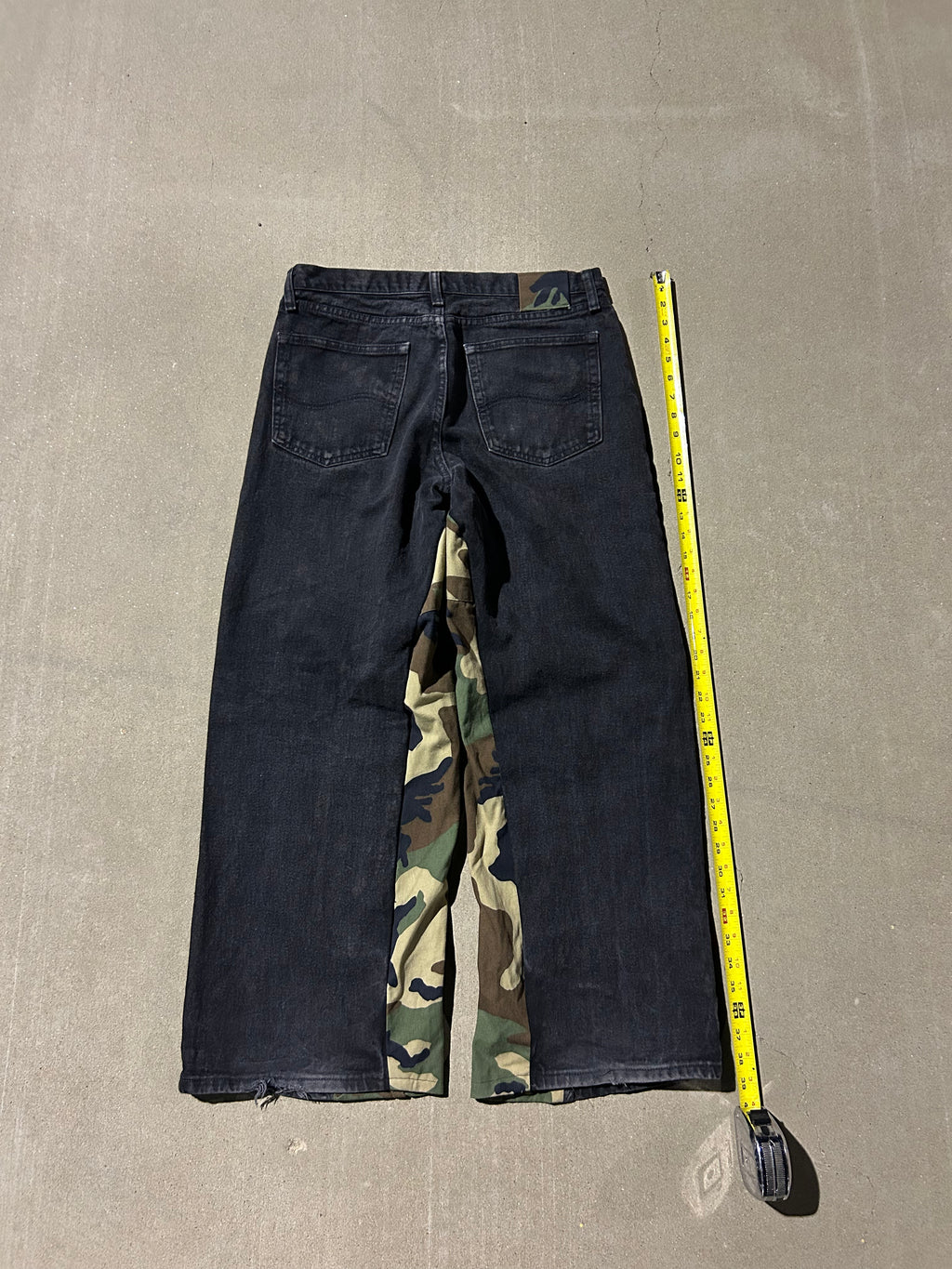 Black jeans with camo inserts