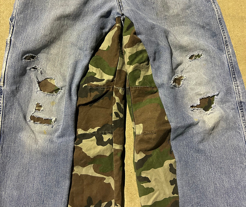 Blue jeans with camo inserts