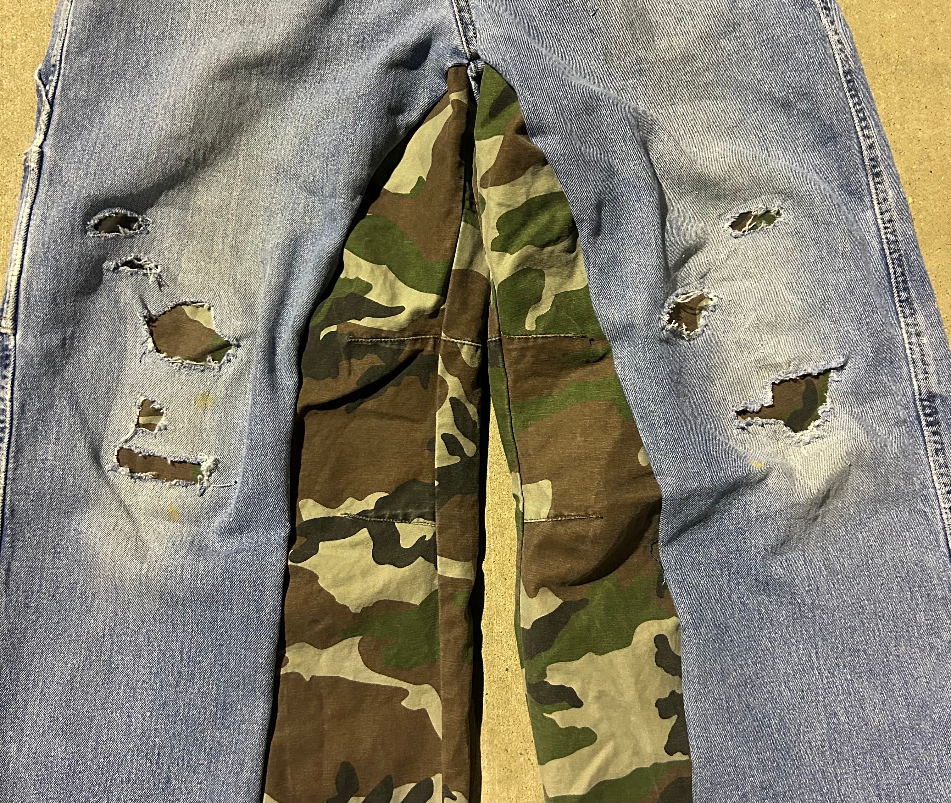 Blue jeans with camo inserts
