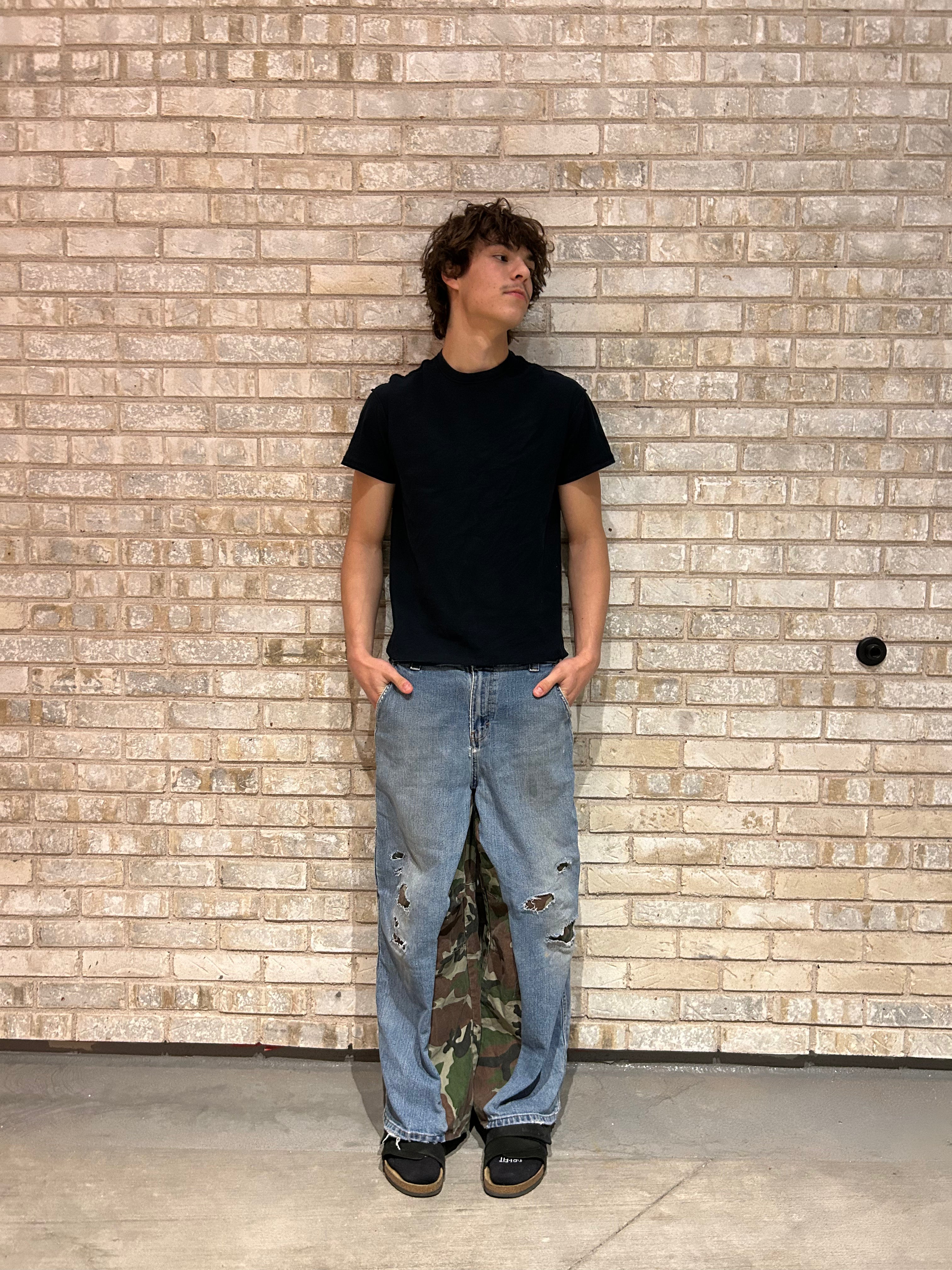 Blue jeans with camo inserts